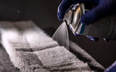 Spraying on a piece of fabrics